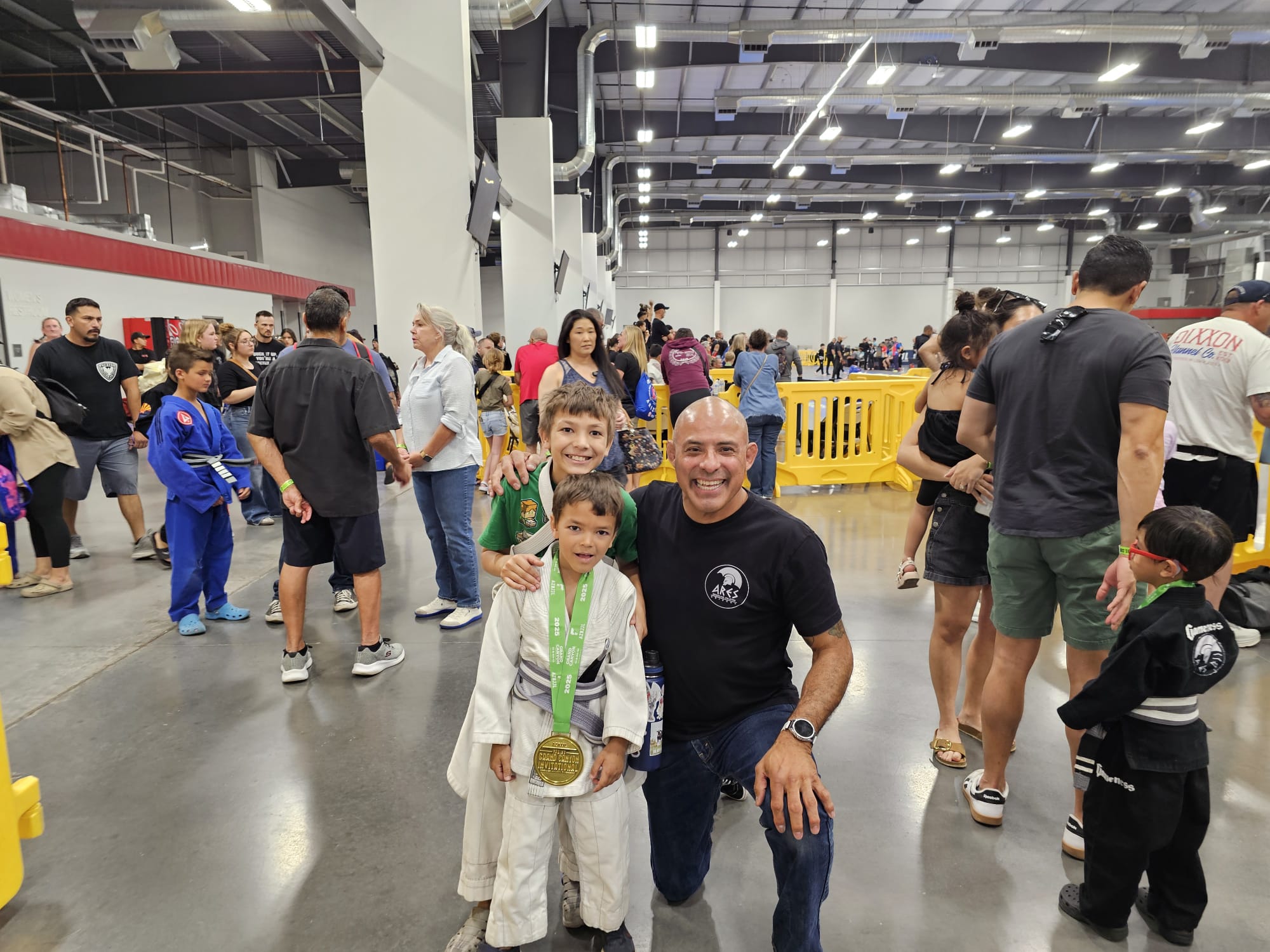 Coach Paul Nava on the mats